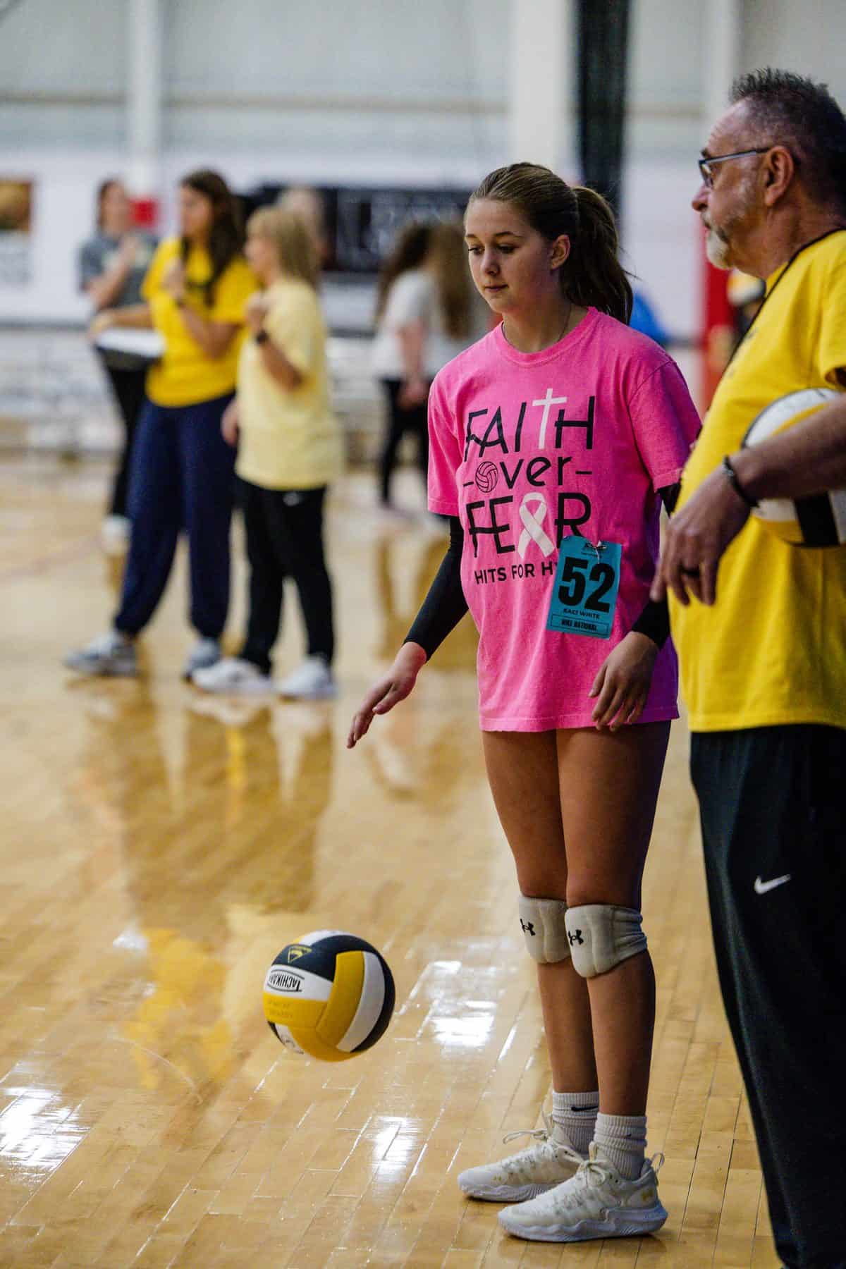 An NSSC coach gives feedback to an athlete during tryouts