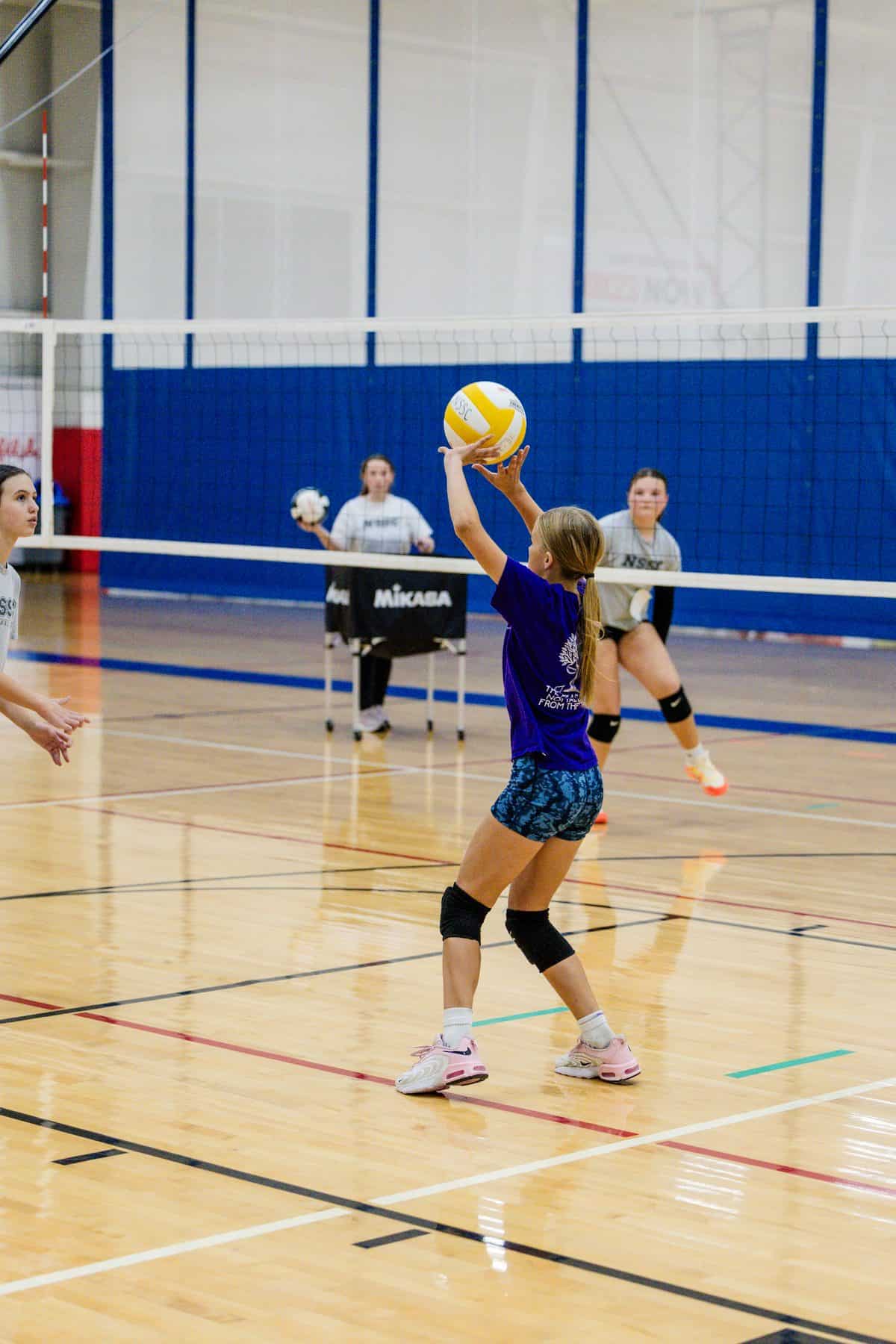 A 12U athlete sets during NSSC tryouts